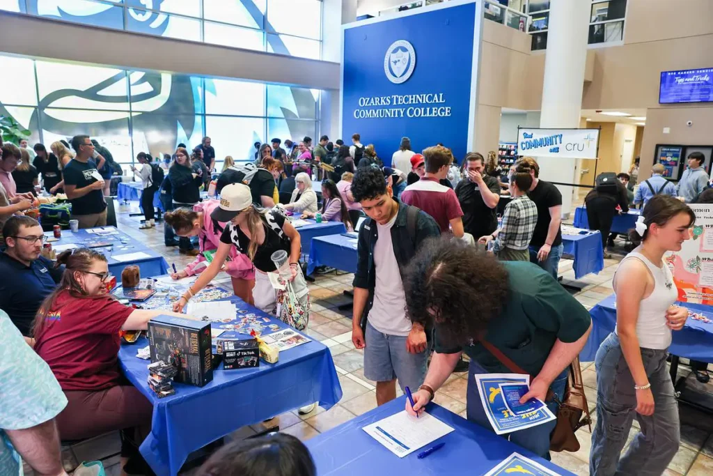 Students explore tables and sign up for organizations during Club Rush in the OTC atrium.