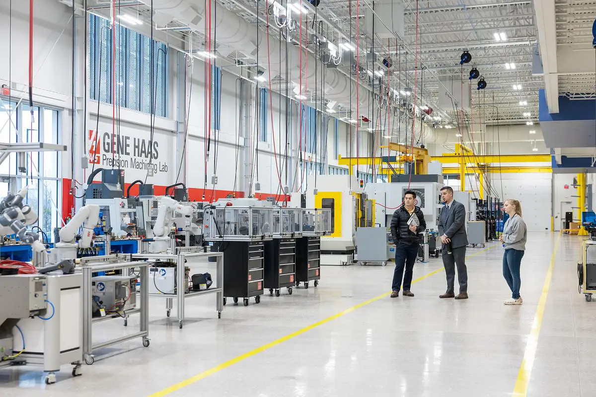 Students and instructor inside the Gene Haas Precision Machining Lab at the Robert W. Plaster Center for Advanced Manufacturing.
