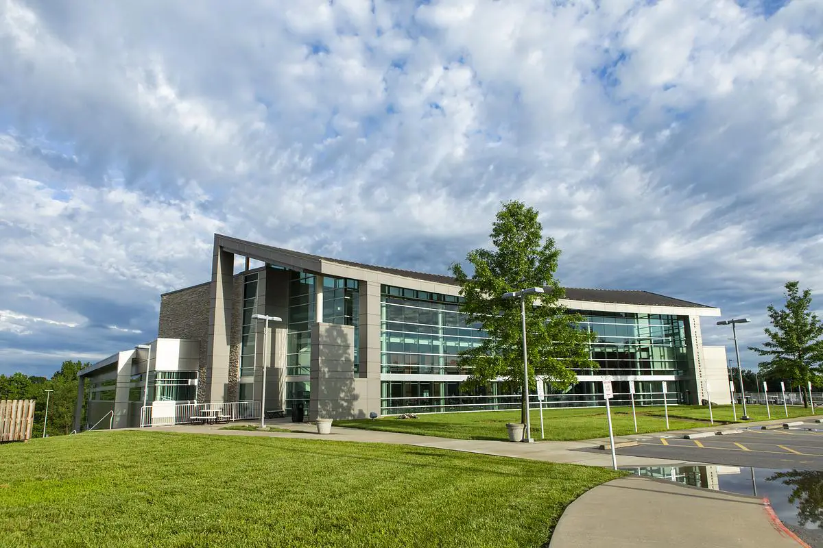 Exterior of Ozarks Technical Community College’s Richwood Valley Campus building under a partly cloudy sky.