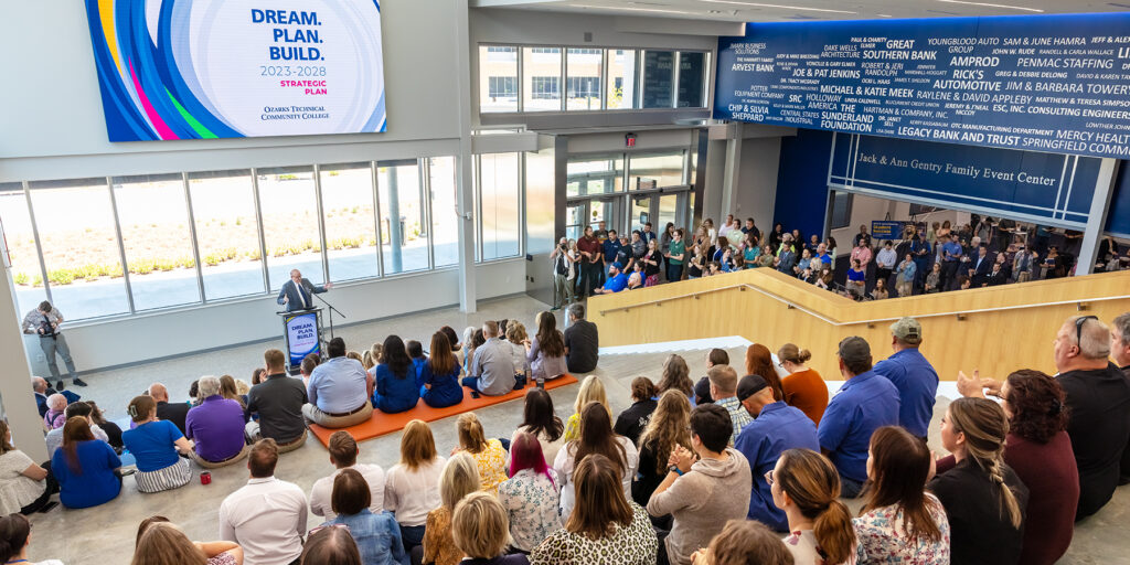 Ozarks Tech Faculty and Staff are depicted attending the unveiling of a new Strategic Plan