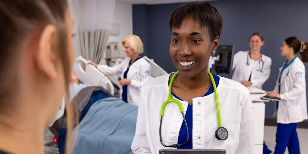 Ozarks Tech Nursing students are depicted treating a patient