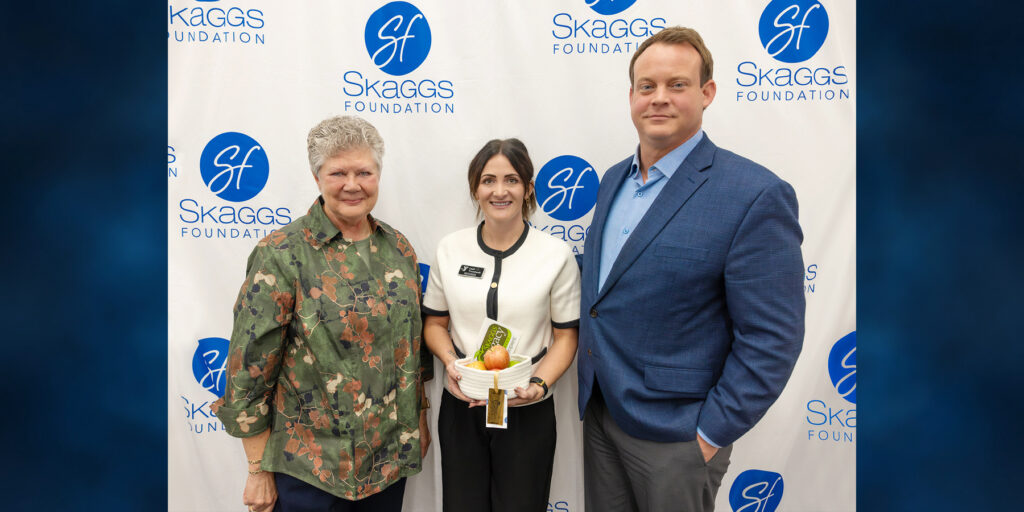 Steve Fouse is depicted next to representatives from the Scaggs Foundation