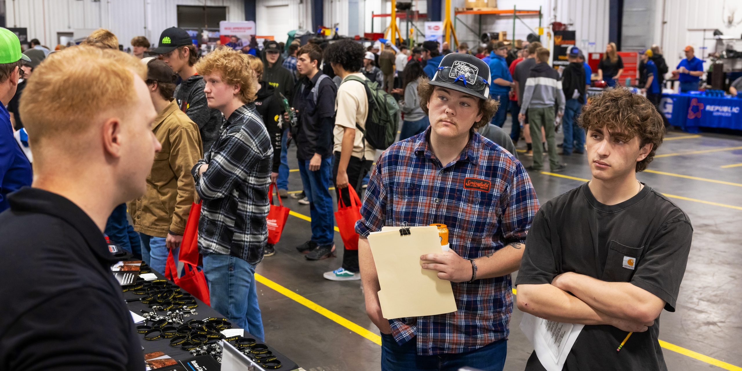 Students are depicted attending the Transportation Career Fair at Ozarks Tech