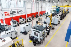 Industrial machines lined up in a row in the Gene Haas Precision Machining Lab on the Ozarks Tech Springfield campus.