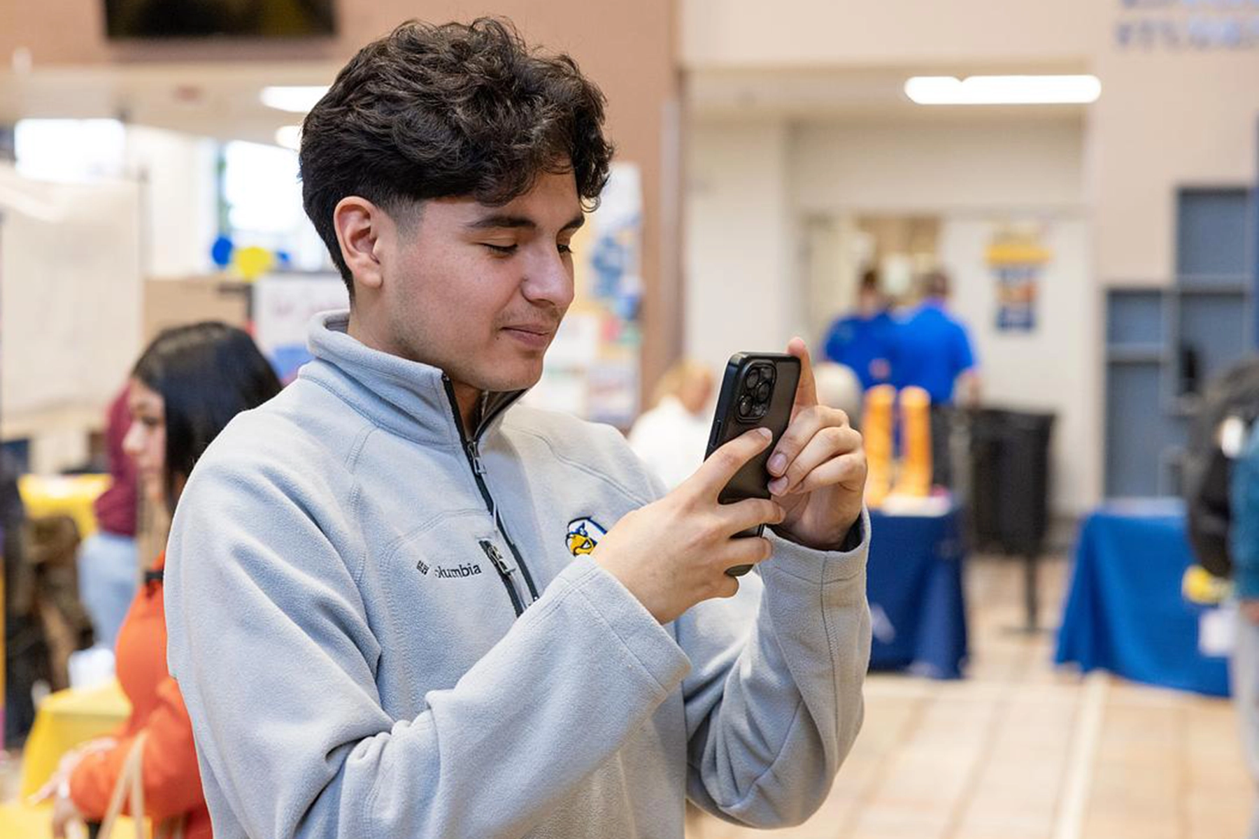 Student scans college ID using Eagle Access on their phone