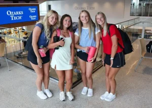 Group of students pose upstairs at The U